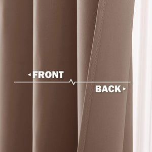 Close-up of taupe brown blackout curtain, highlighting its smooth front and a textured back with diagonal weave.