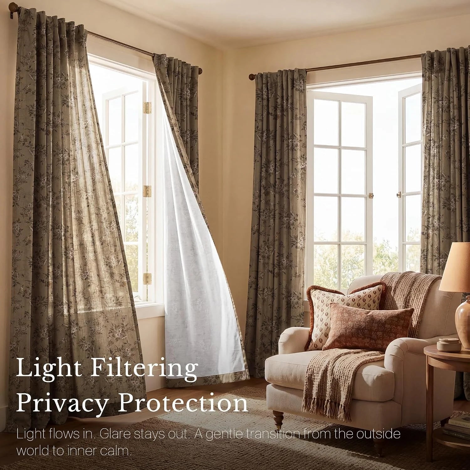 Taupe floral light-filtering curtains in a warm beige living room with armchair