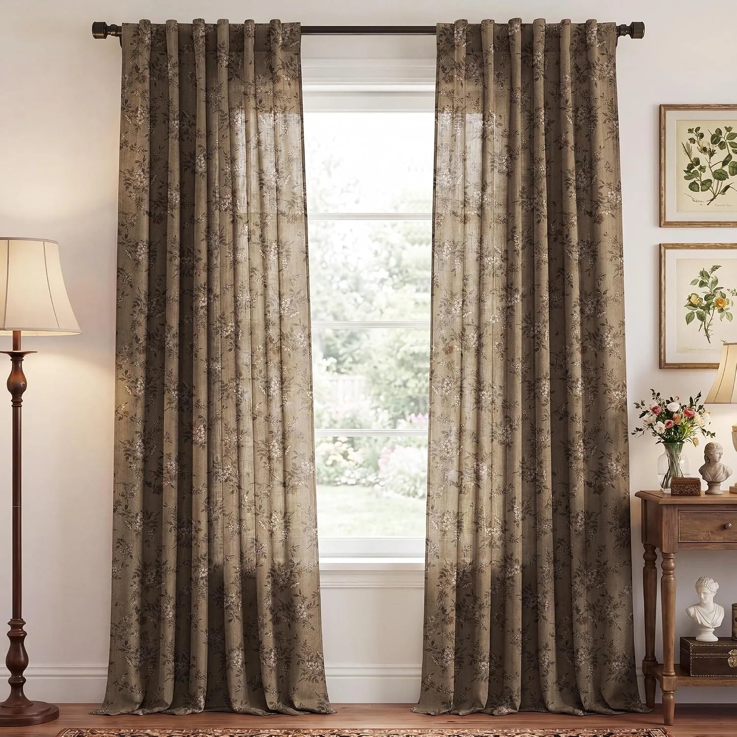 Taupe floral sheer curtains hanging on a dark rod in a traditional living room