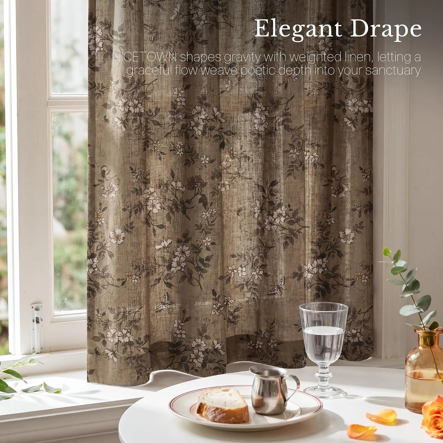 Taupe linen floral curtain panel hanging by a bright window above a cozy breakfast table