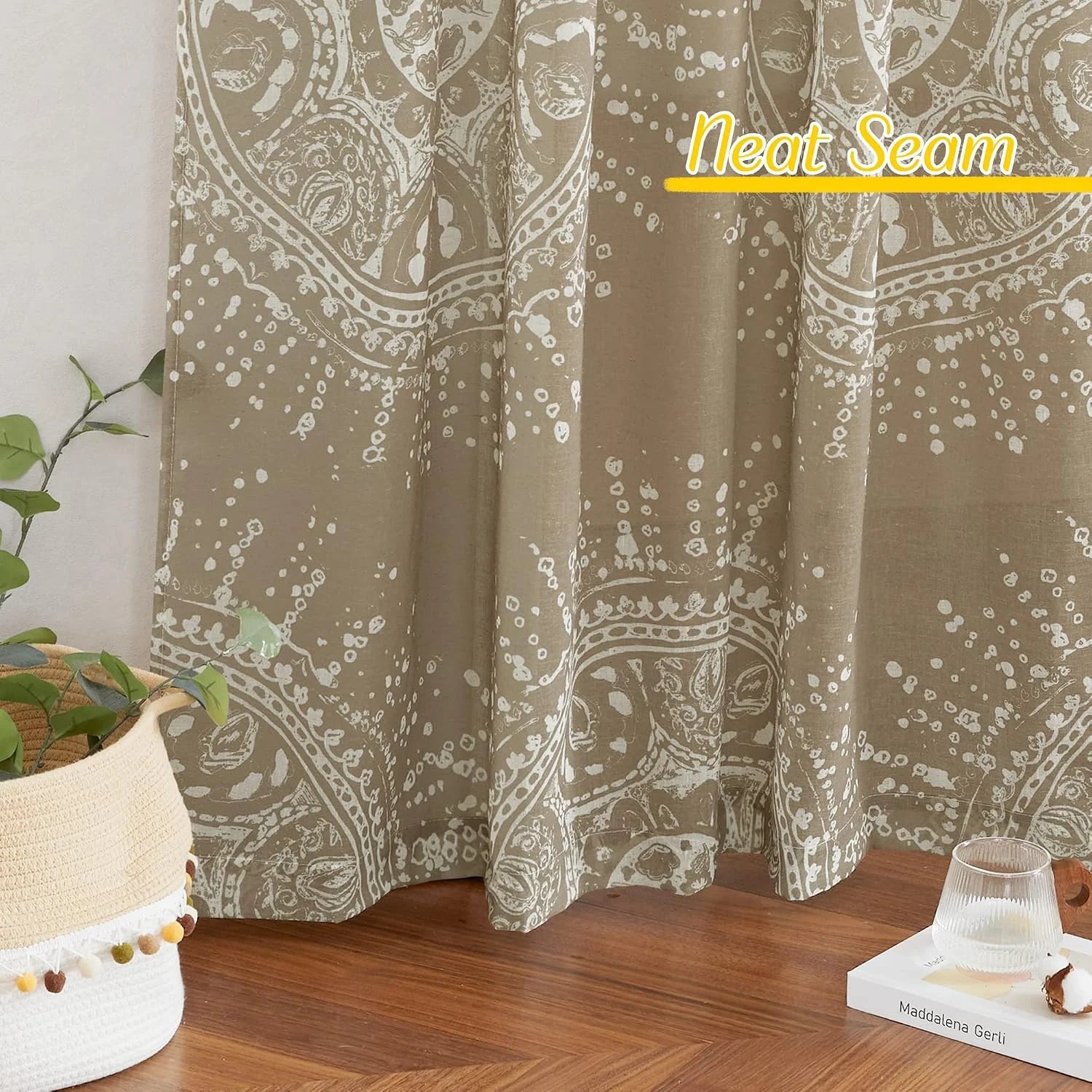 Taupe paisley print curtains with neat seam detail in a cozy modern room
