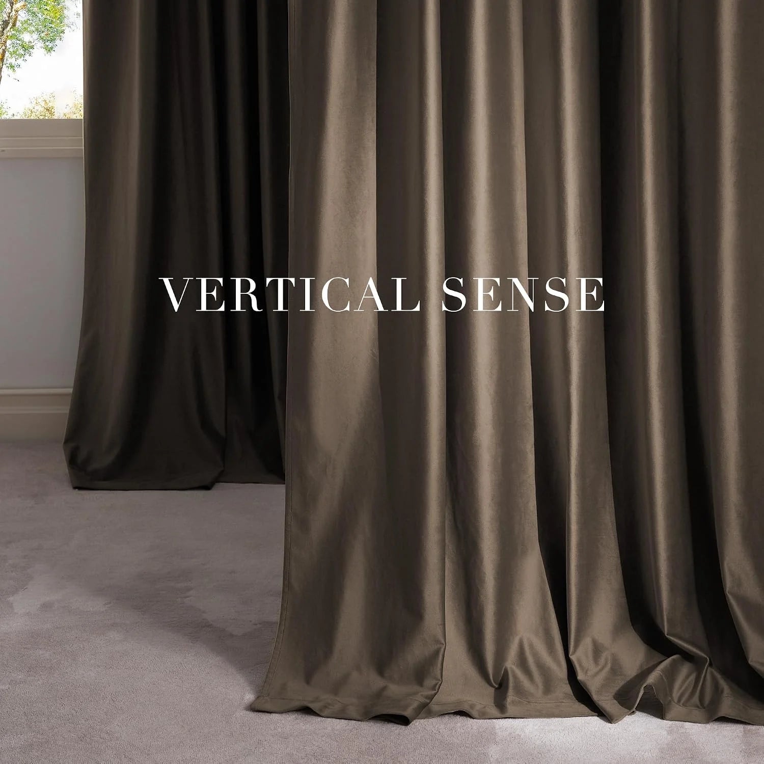 Taupe satin drapes with soft sheen hanging in tall folds by a modern window
