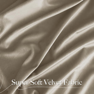 Close-up of super soft, elegantly draped taupe velvet fabric, highlighting its plush texture.
