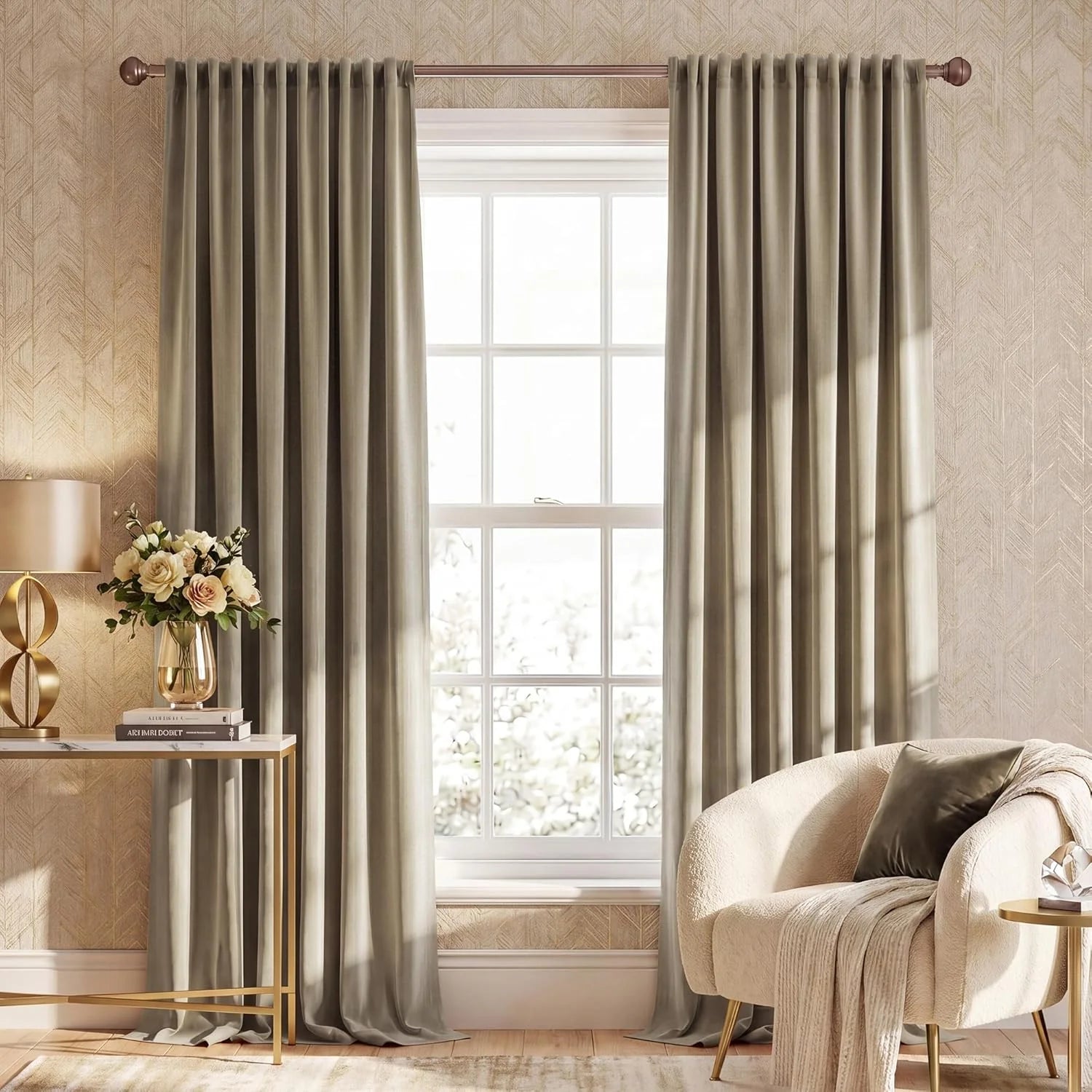 Taupe velvet pleated curtains on a bronze rod in a warm, elegant living room