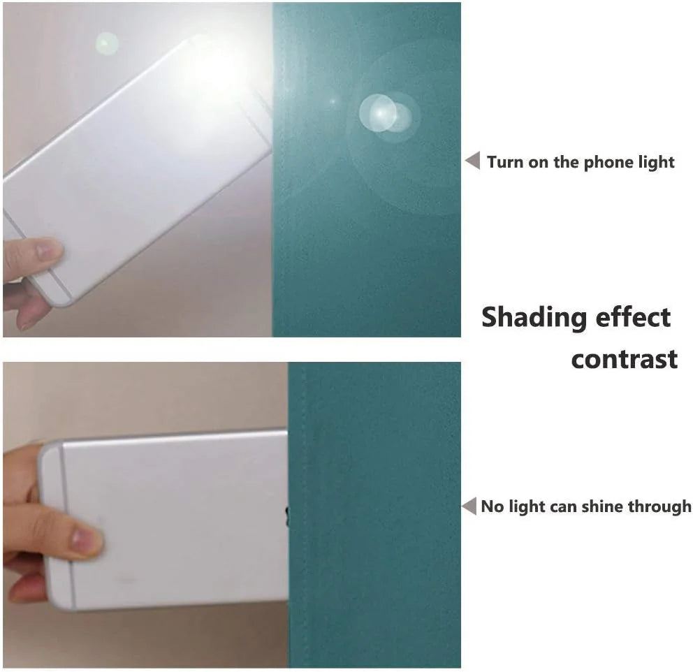Hand holding phone flashlight behind teal blackout curtain showing strong light blocking