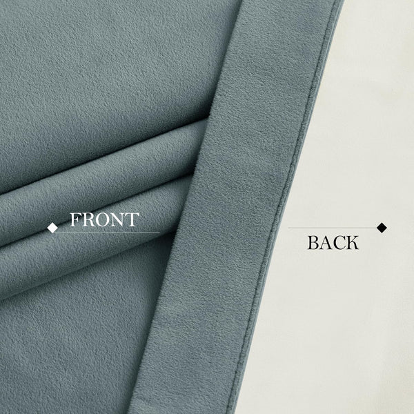 Close-up of a teal brushed blackout curtain fabric showing its soft, plush front and smoother back.