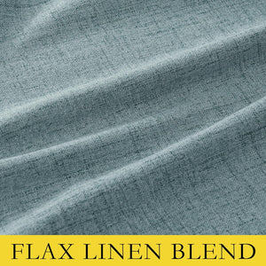 Close-up of teal flax linen blend fabric showing visible woven texture and soft drapes.