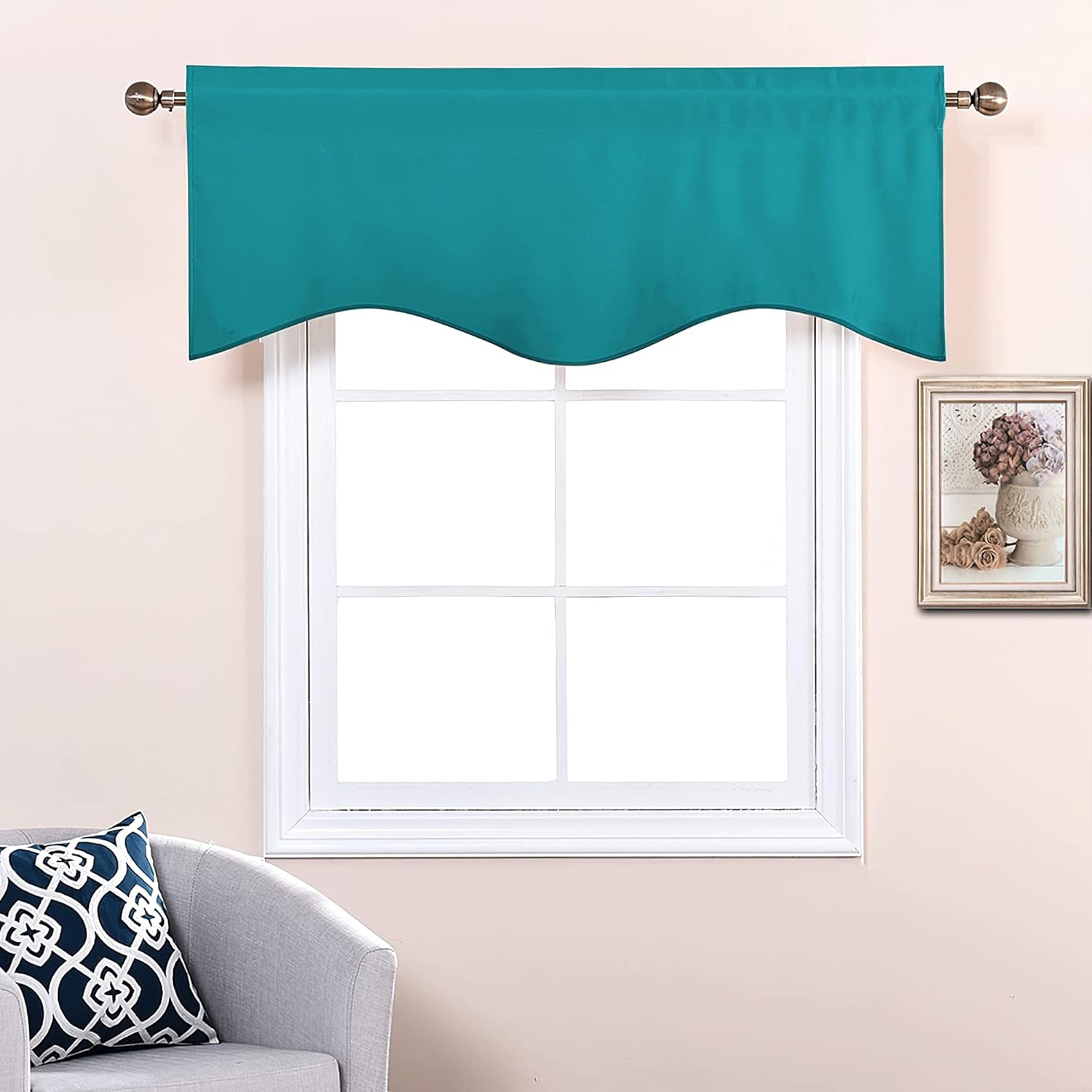 Teal rod pocket window valance with a decorative scalloped bottom edge, hung over a white window.