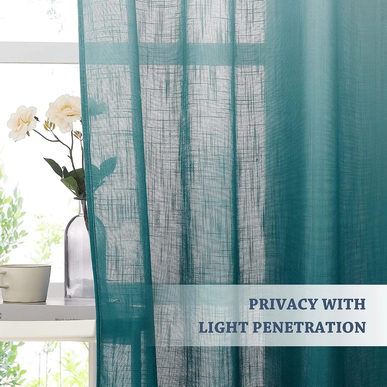 Teal sheer linen-look curtain filtering daylight beside a window with flowers