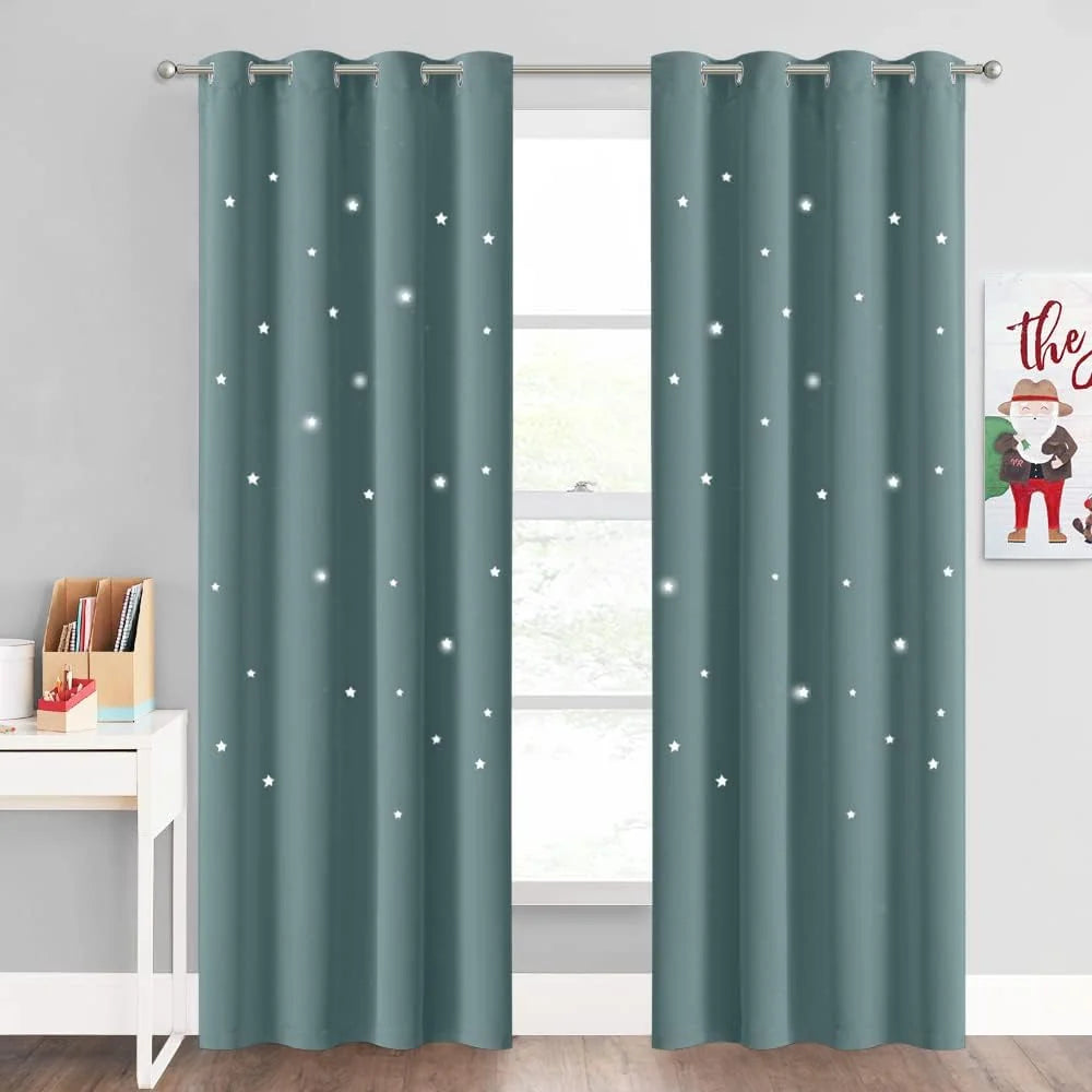 Teal blackout curtains with white star print and silver grommets in kids room