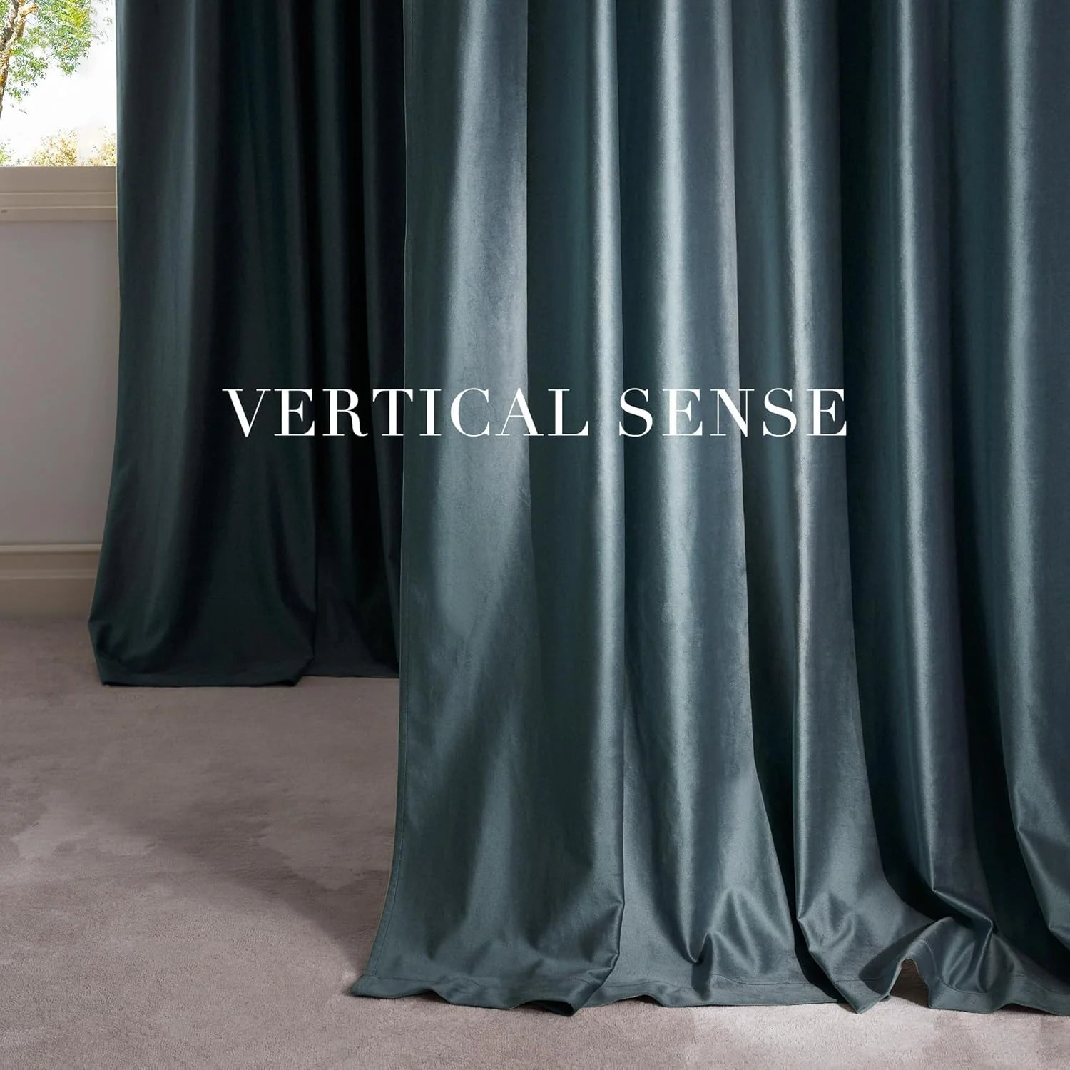 Teal velvet drapes with soft sheen pooling on carpet beside a bright window