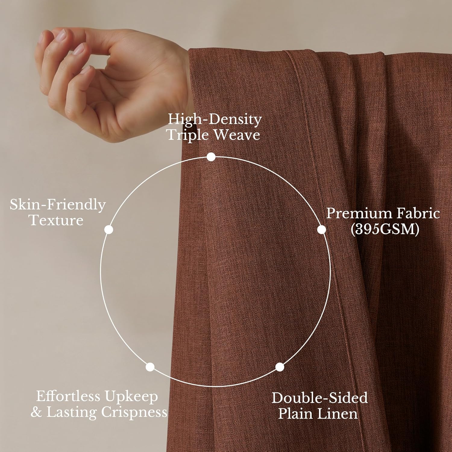 Hand gently touching a folded terracotta linen fabric, showing its soft, dense, double-sided plain weave.
