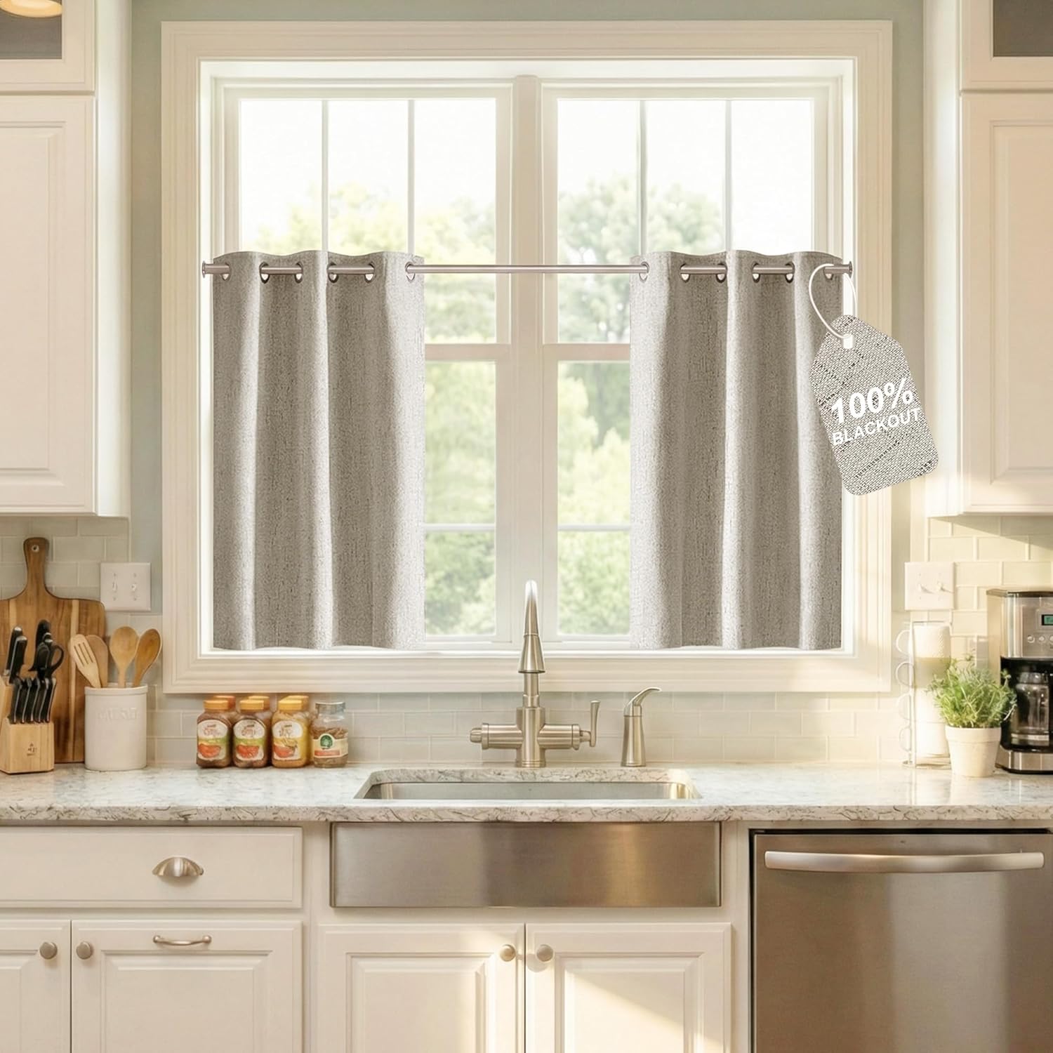 Textured gray grommet top blackout cafe curtains hanging over a kitchen sink window.