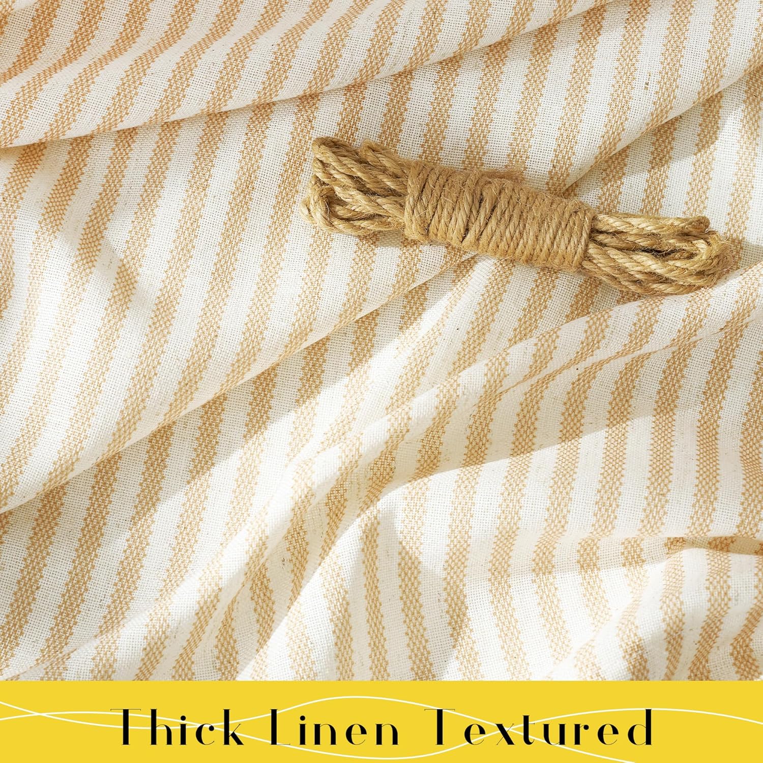 Thick, textured cream linen fabric with vertical tan stripes, showcasing a coiled natural rope.