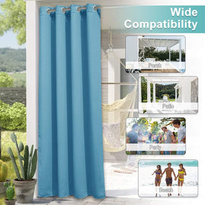 Vibrant turquoise outdoor curtain panel with silver grommets hangs on a patio doorway, offering shade.