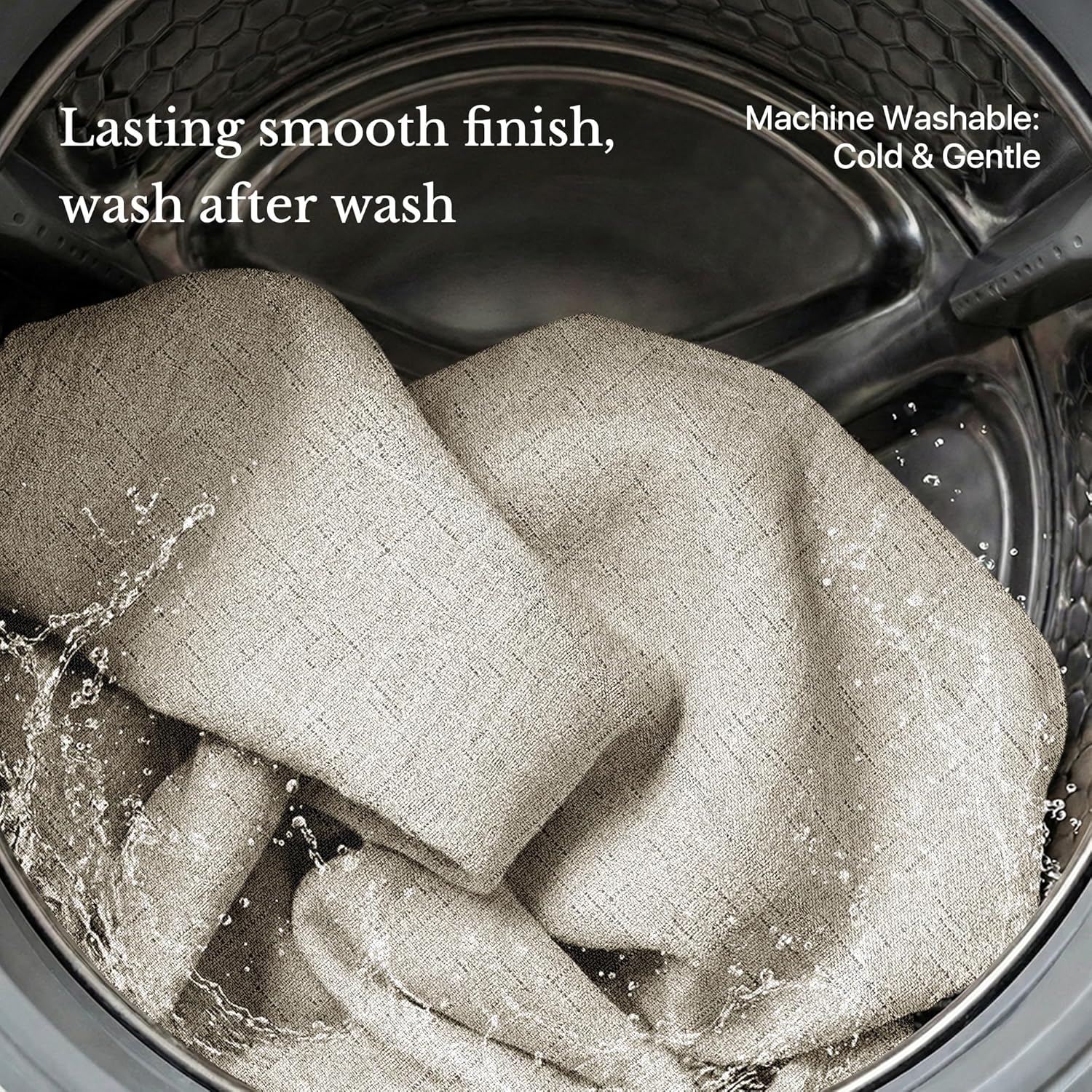 Textured beige fabric washing in machine, water splashes, highlighting its durable, smooth finish.