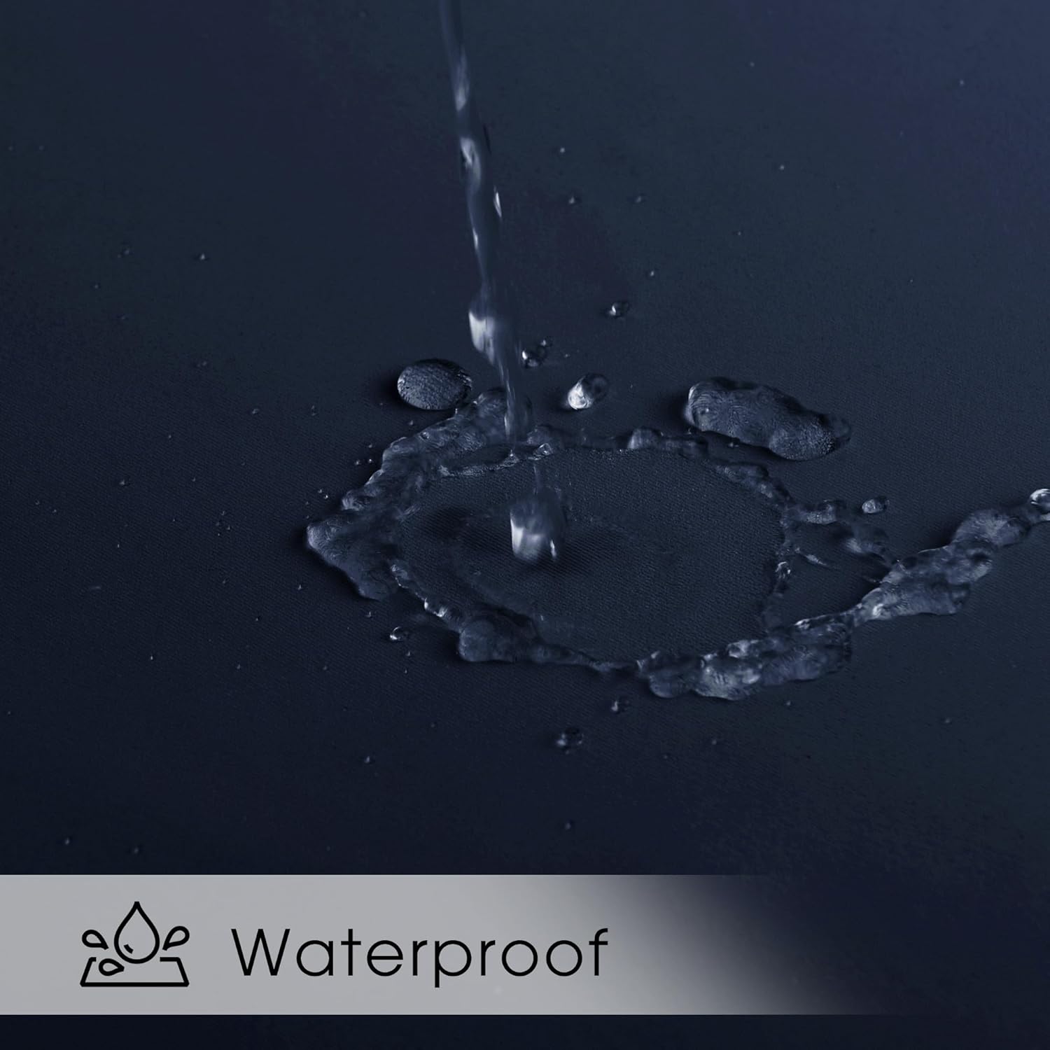 Close-up of water beading and repelling from a textured dark blue fabric, demonstrating its waterproof quality.