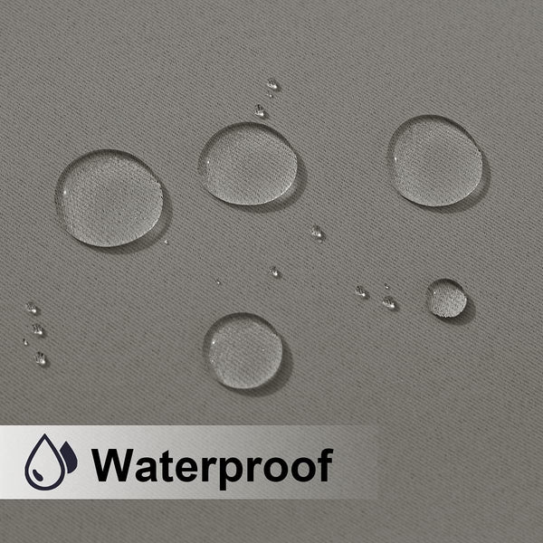 Close-up of grey waterproof fabric with clear water droplets beading on the surface, showcasing water resistance.