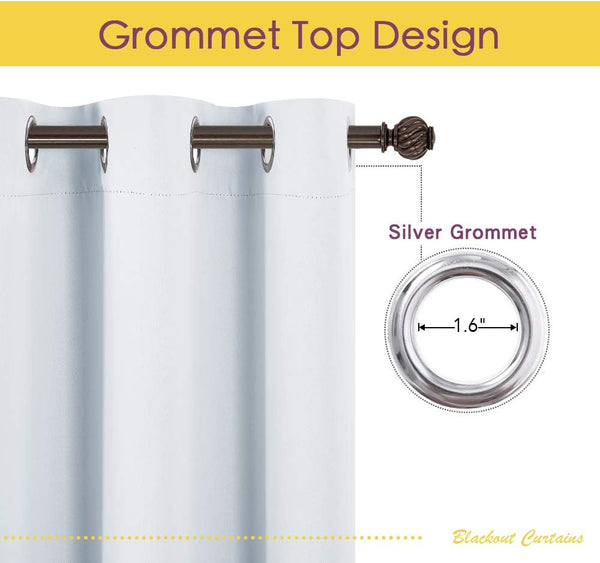 White blackout curtain panel showing a silver grommet top with 1.6-inch diameter rings on a dark curtain rod.