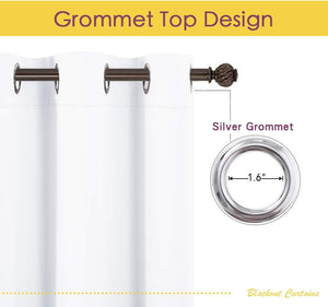 Close-up of a white blackout curtain with silver 1.6-inch diameter grommet top on a dark rod.