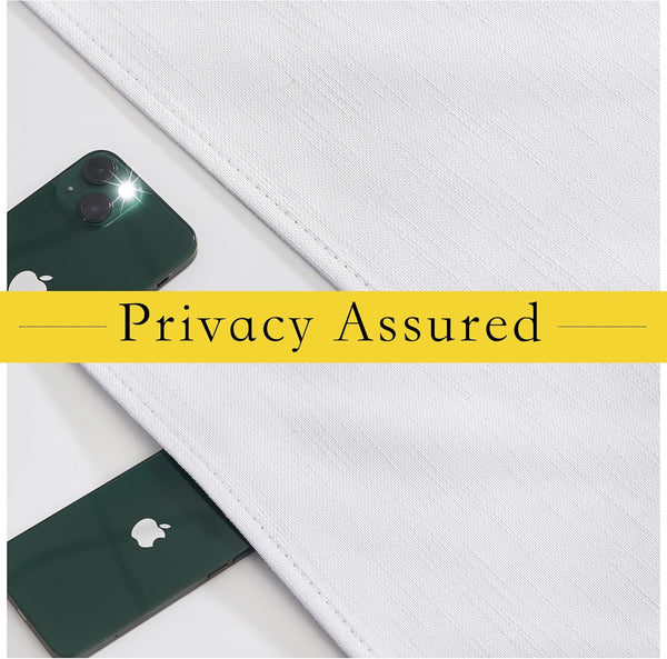 White textured fabric demonstrates privacy by completely obscuring a hidden smartphone's flash.