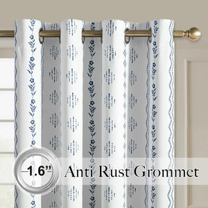 White curtains with blue floral and geometric striped patterns. Features metal anti-rust grommet tops.