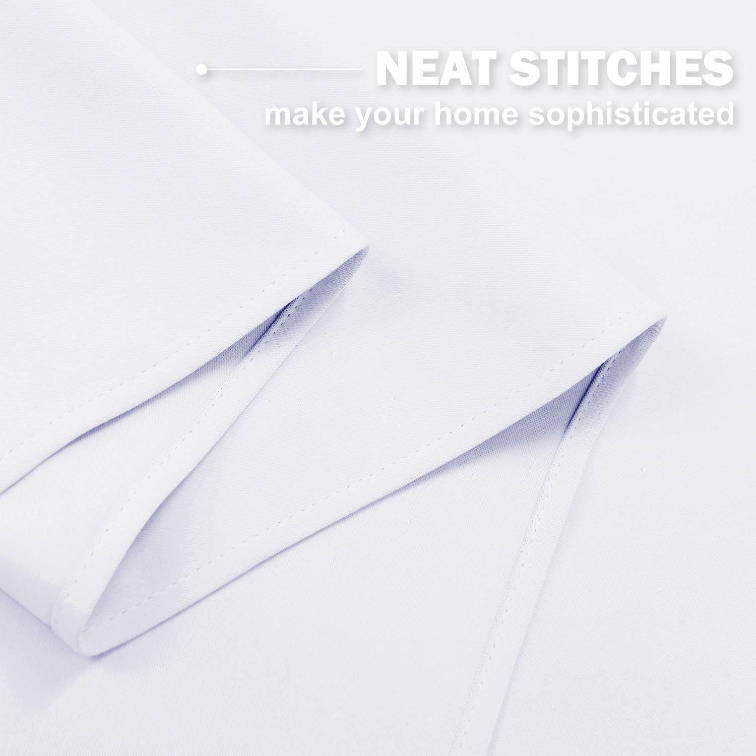 Close-up of crisp white fabric showing meticulously neat stitching along a folded edge, highlighting quality craftsmanship.