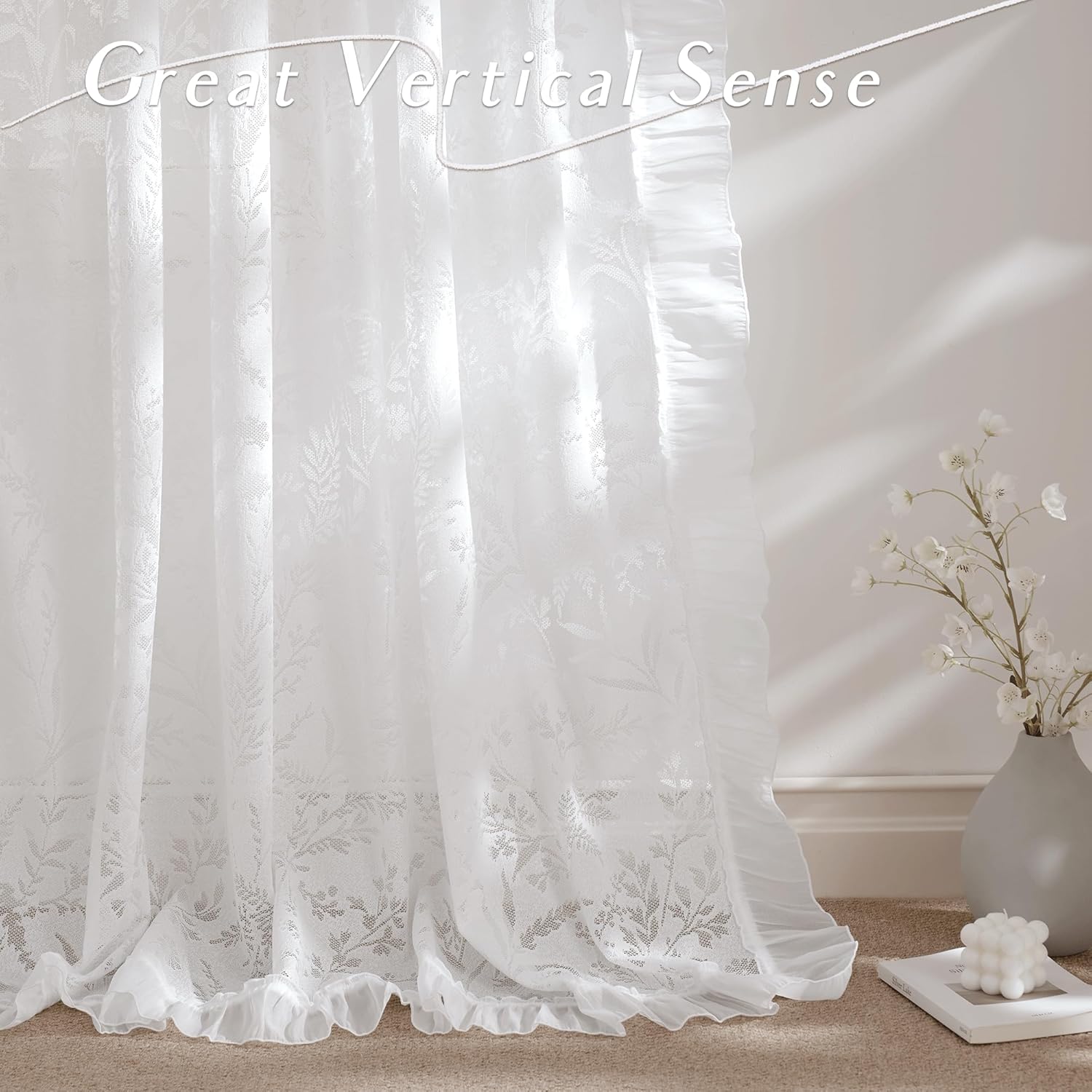 White sheer curtain panel with a delicate floral lace pattern and elegant ruffled edges.