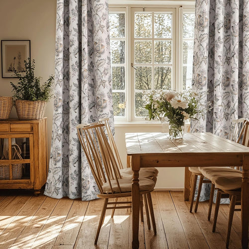 Elegant white curtains with intricate brown and grey floral pattern in a rustic dining room setting.