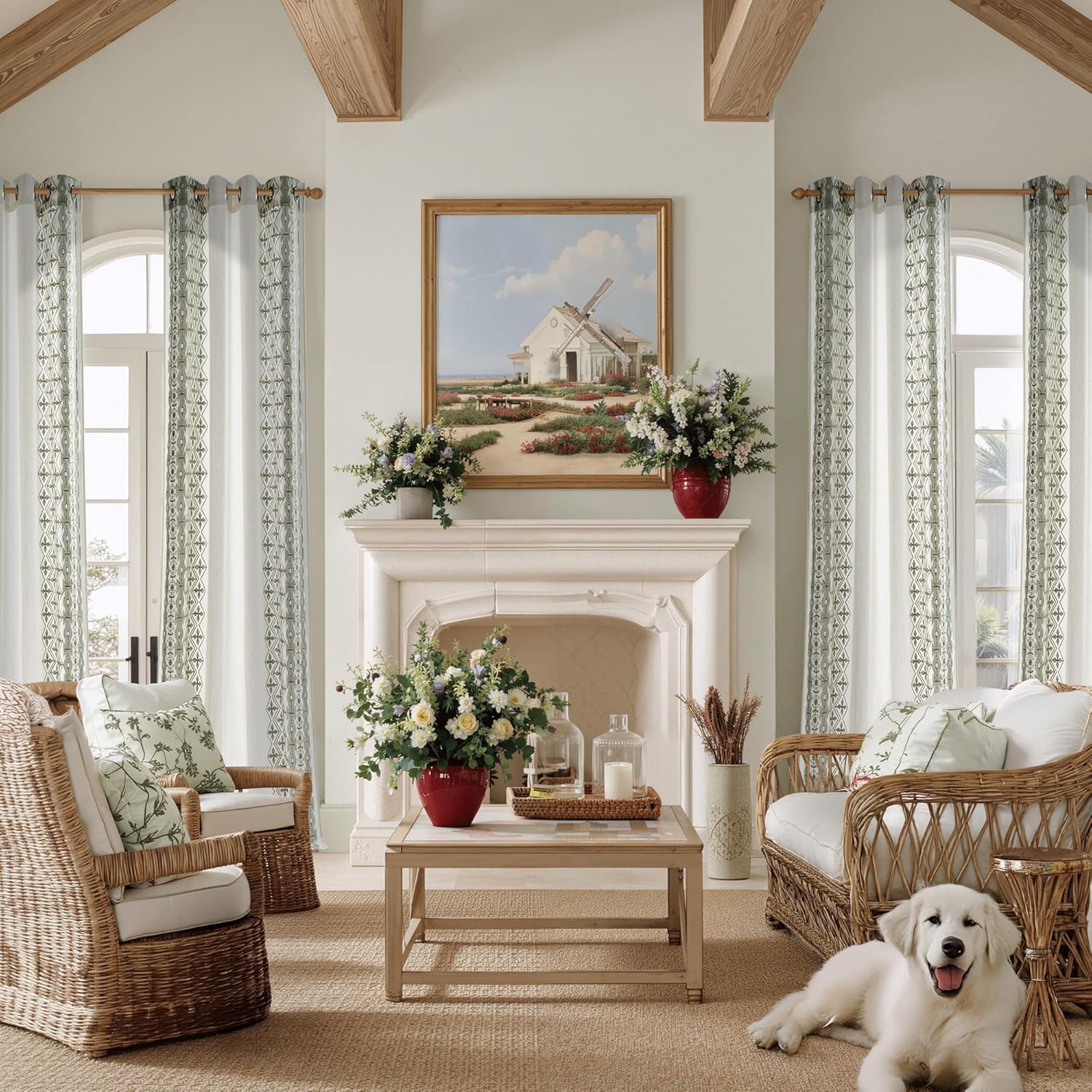 White sheer curtains with green geometric pattern trim and grommet tops, framing arched windows in a bright living room.