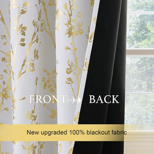 White curtain with gold floral pattern, revealing thick black 100% blackout lining. Window in background.