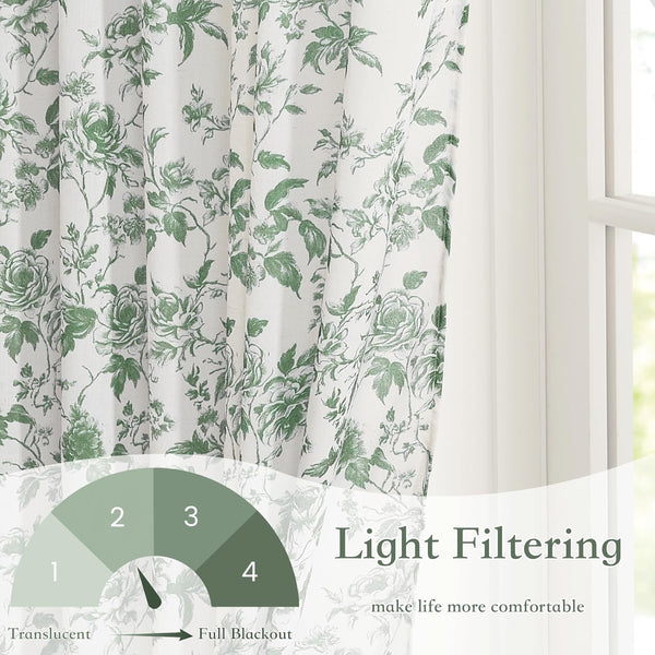 White curtains with a green floral toile pattern featuring elegant roses and leaves, offering light filtering.