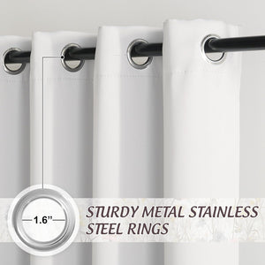 Close-up of white grommet top curtains with sturdy 1.6-inch stainless steel rings on a black rod.
