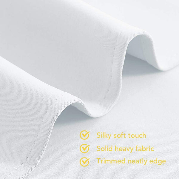 Close-up of smooth white fabric, highlighting its silky texture, heavy drape, and neat stitching along the edge.