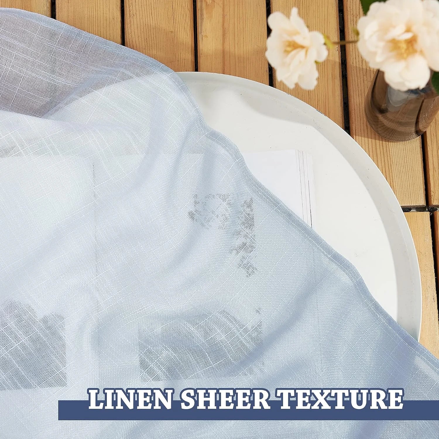 White linen sheer fabric draped on a tray table with airy woven texture detail