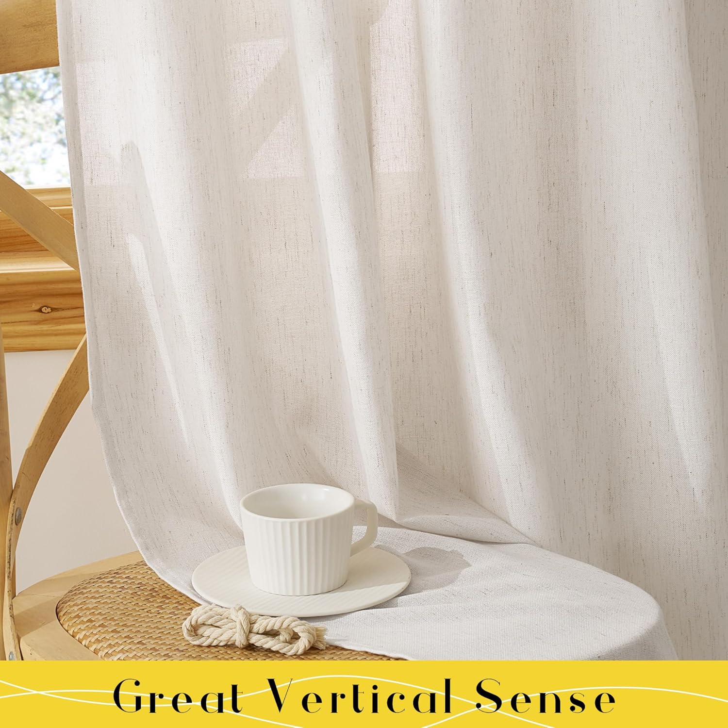 Softly draped off-white textured linen light-filtering curtain by a window, diffusing natural light.