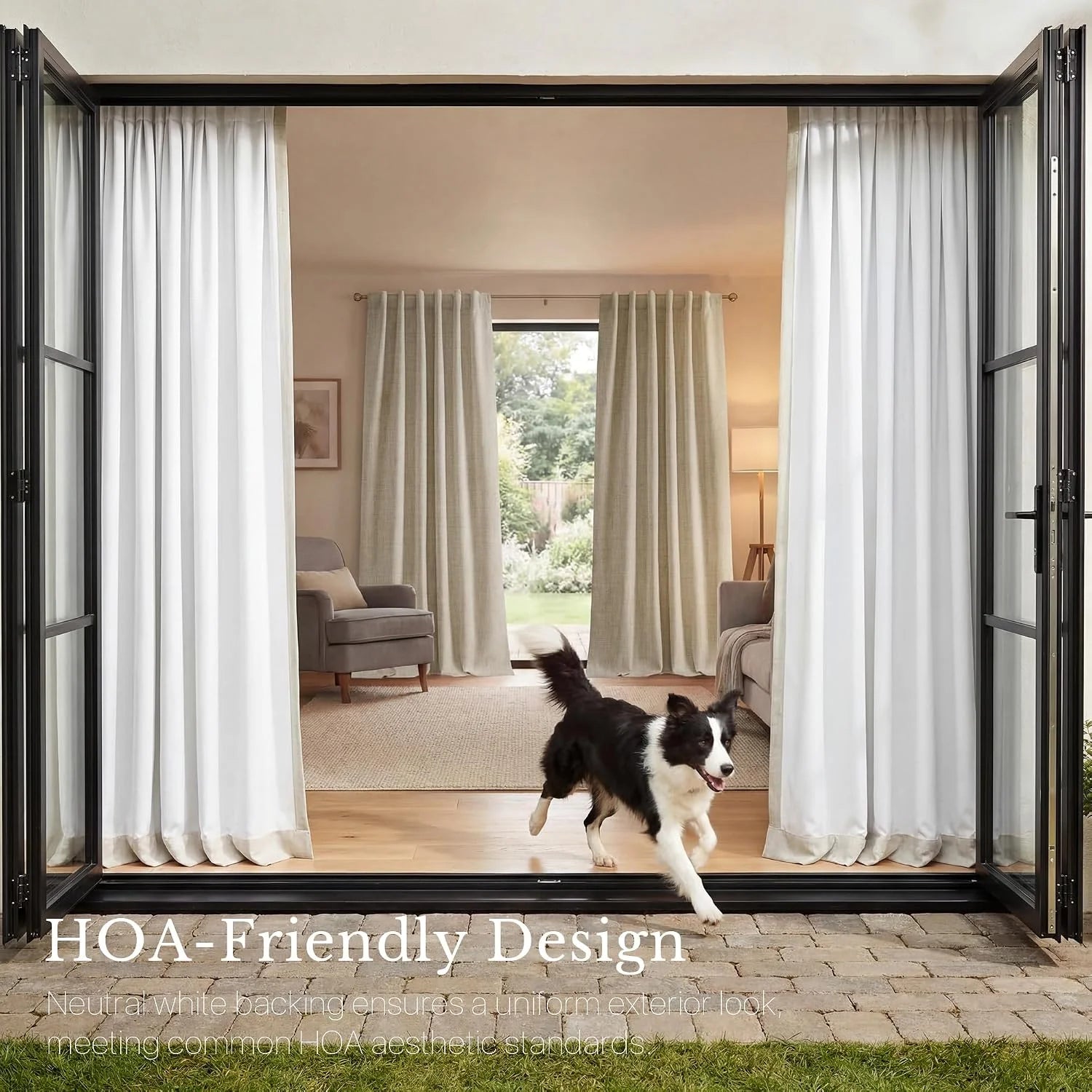 White pleated curtains framing black bifold patio doors with a dog running in a bright living room.