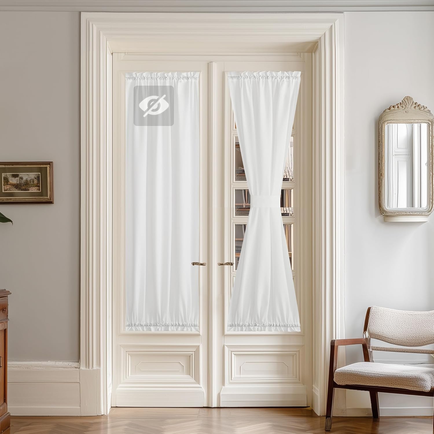 White sheer rod pocket curtains on French doors. One panel tied back, the other provides full privacy.