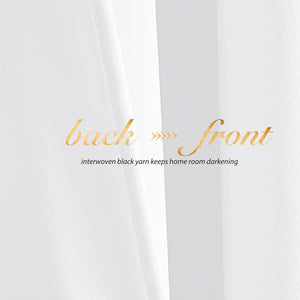 White room darkening curtain fabric. Textured back reveals interwoven black yarn; smooth front.
