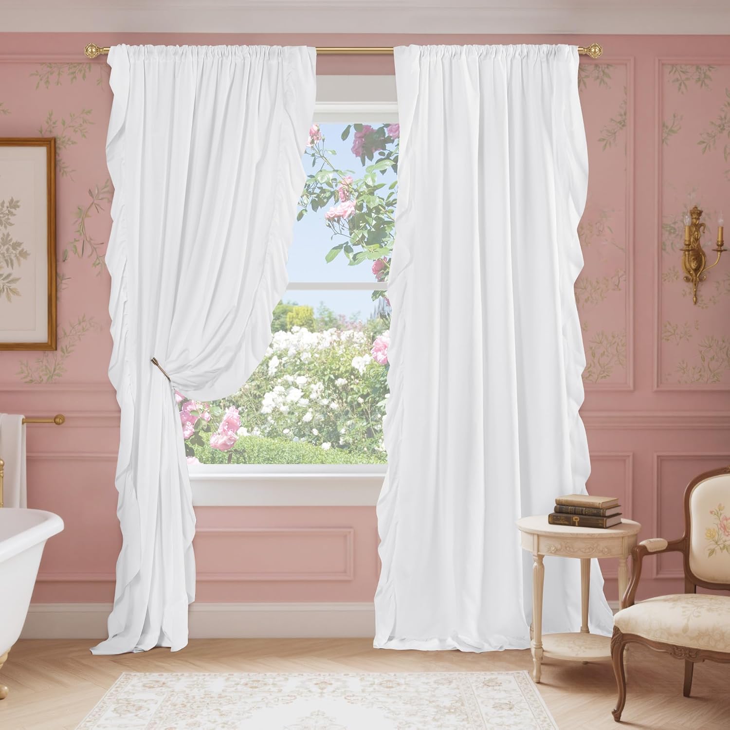 White ruffled rod pocket curtains on a gold rod, one panel tied back, in a pink vintage room with a garden view.