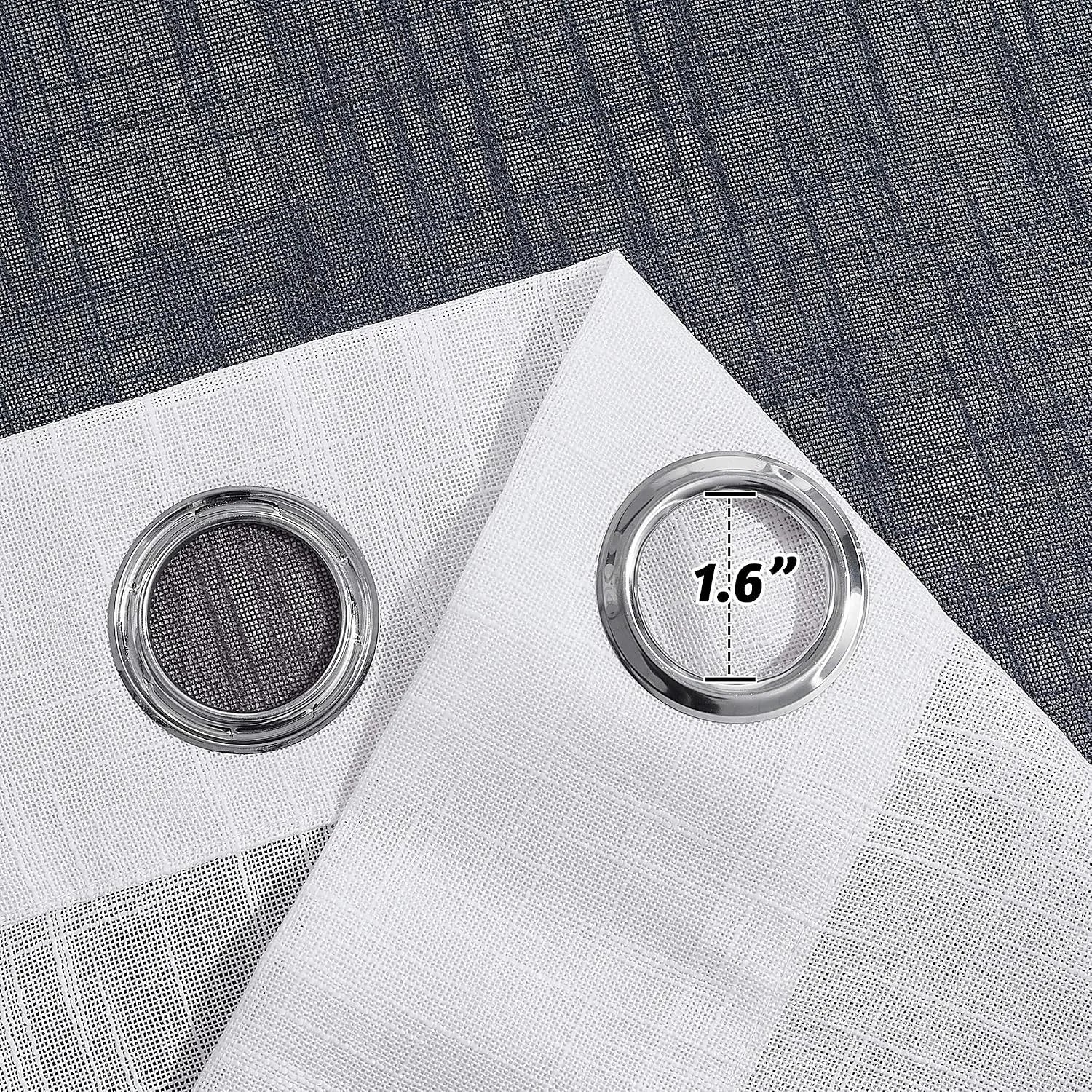 Close-up of white sheer curtain panels with silver grommets and 1.6 inch inner diameter