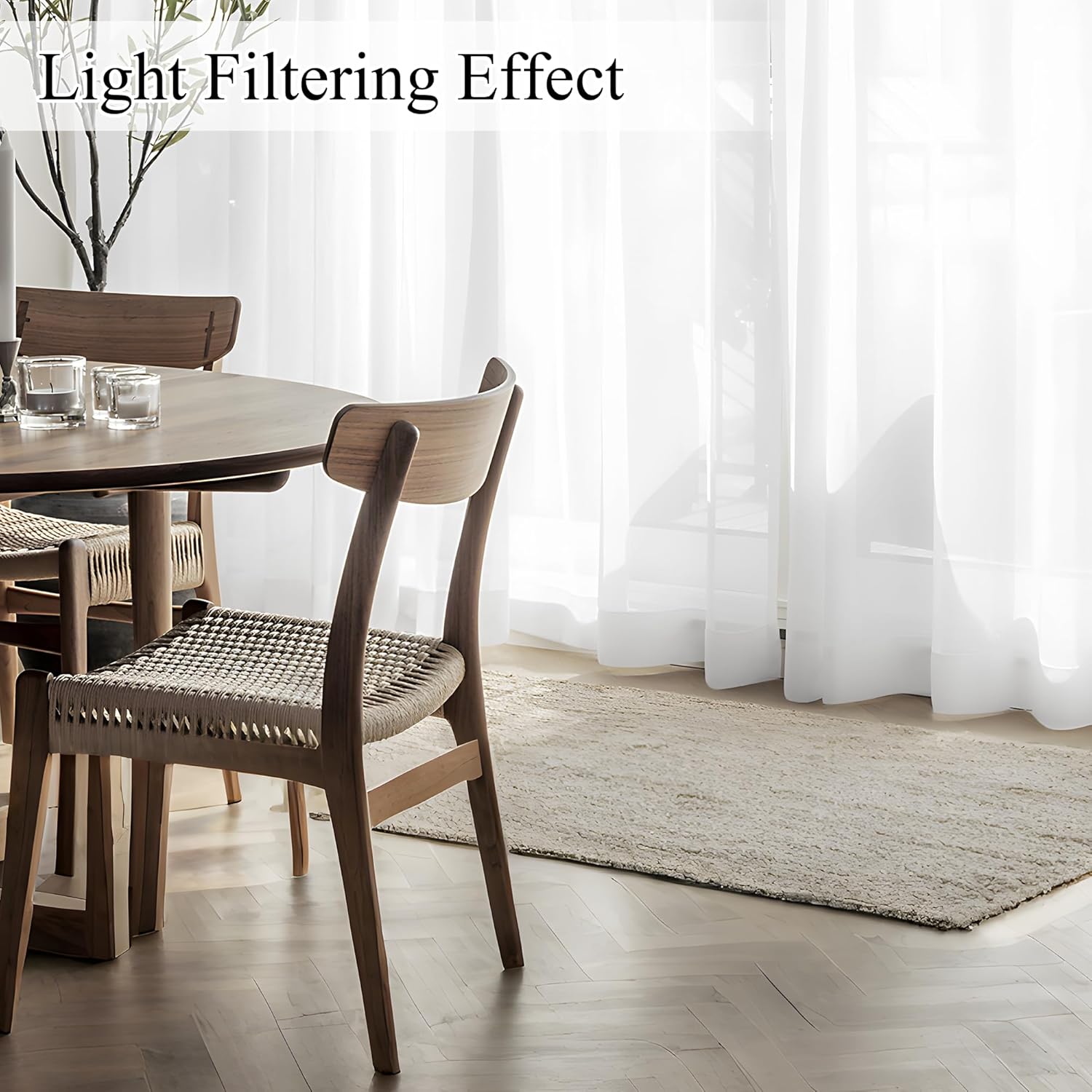 Translucent white sheer window curtains provide a soft light filtering effect in a bright dining room.