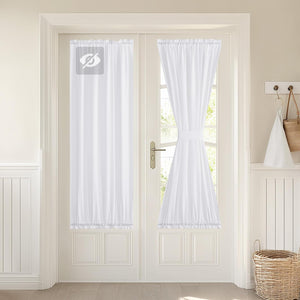 White sheer rod pocket door curtains with ruffled bottom, one panel tied back for light.