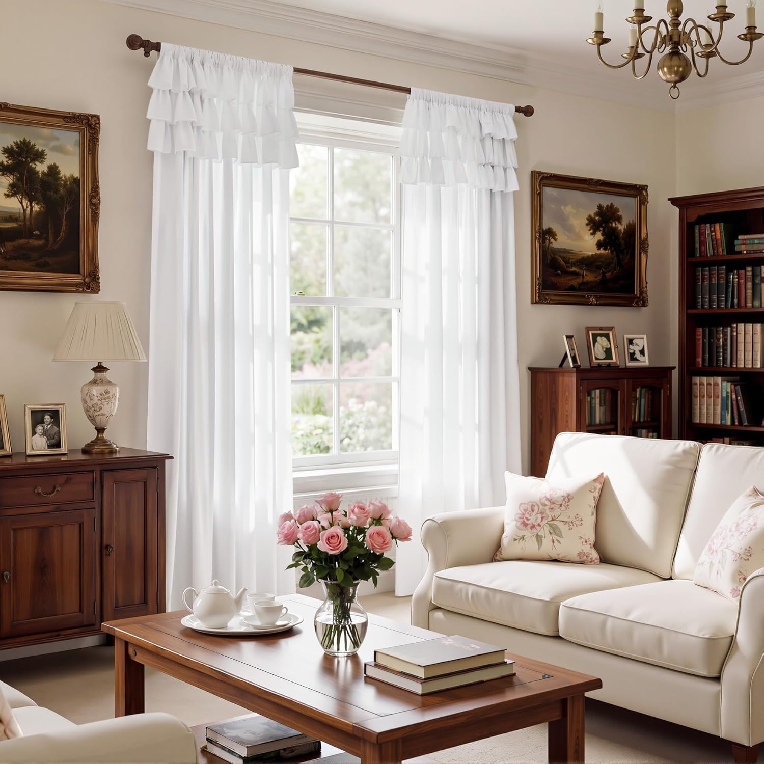 White sheer window curtains with a tiered ruffled rod pocket top, styled in a classic living room.