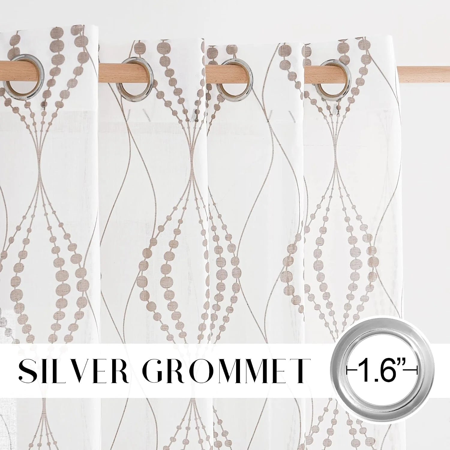 White sheer curtain with silver grommets and taupe geometric bead pattern