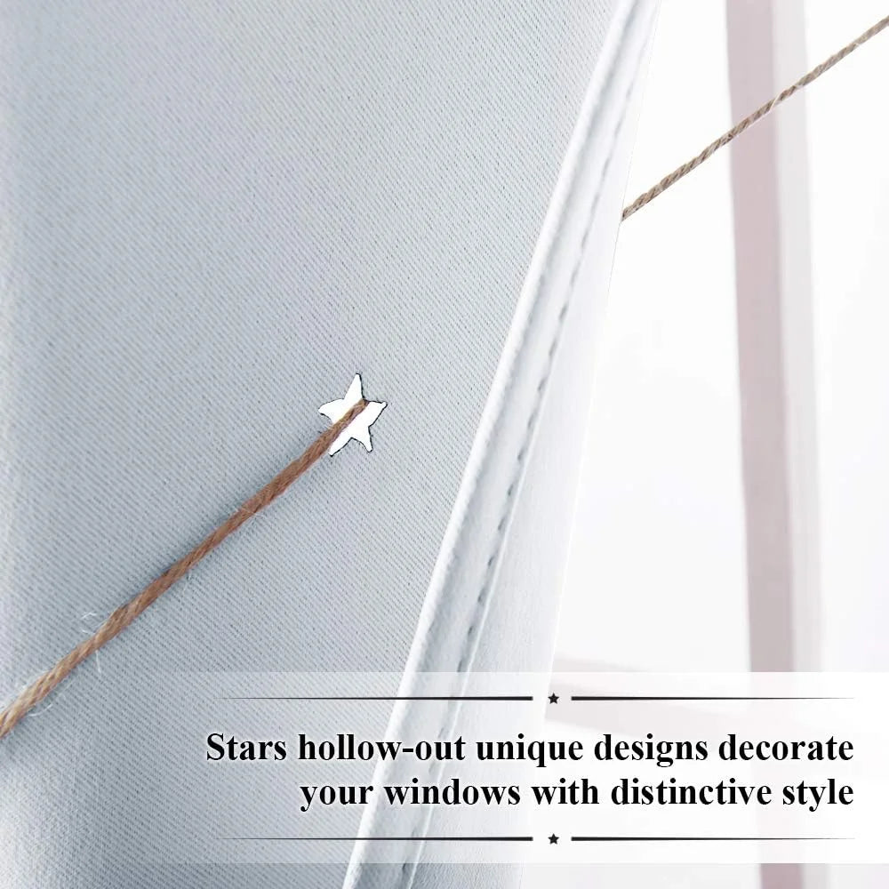 Close-up of white sheer curtain with star hollow cutout and rope detail by window