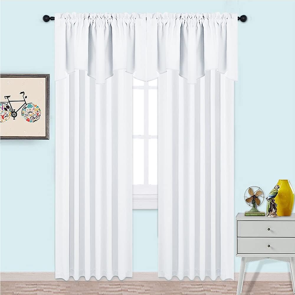 White sheer rod pocket curtains with scalloped valance and subtle vertical stripes