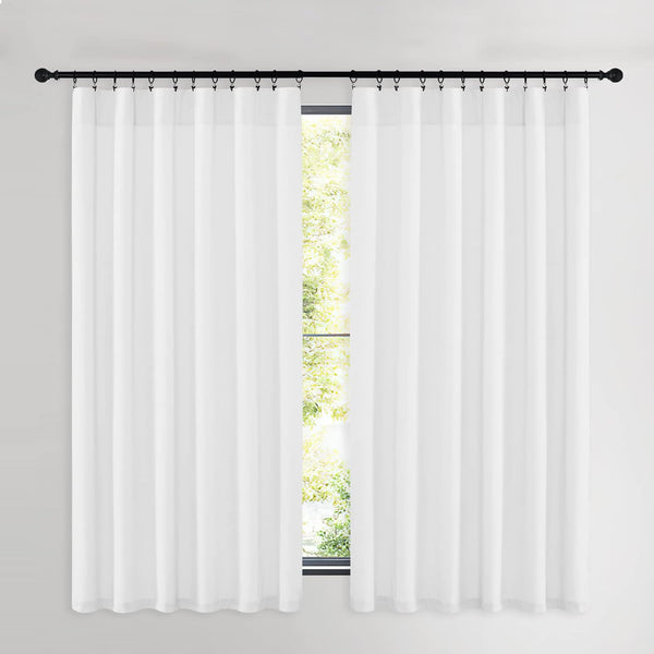 Two white sheer curtain panels hung with clip rings on a black rod in front of a window.