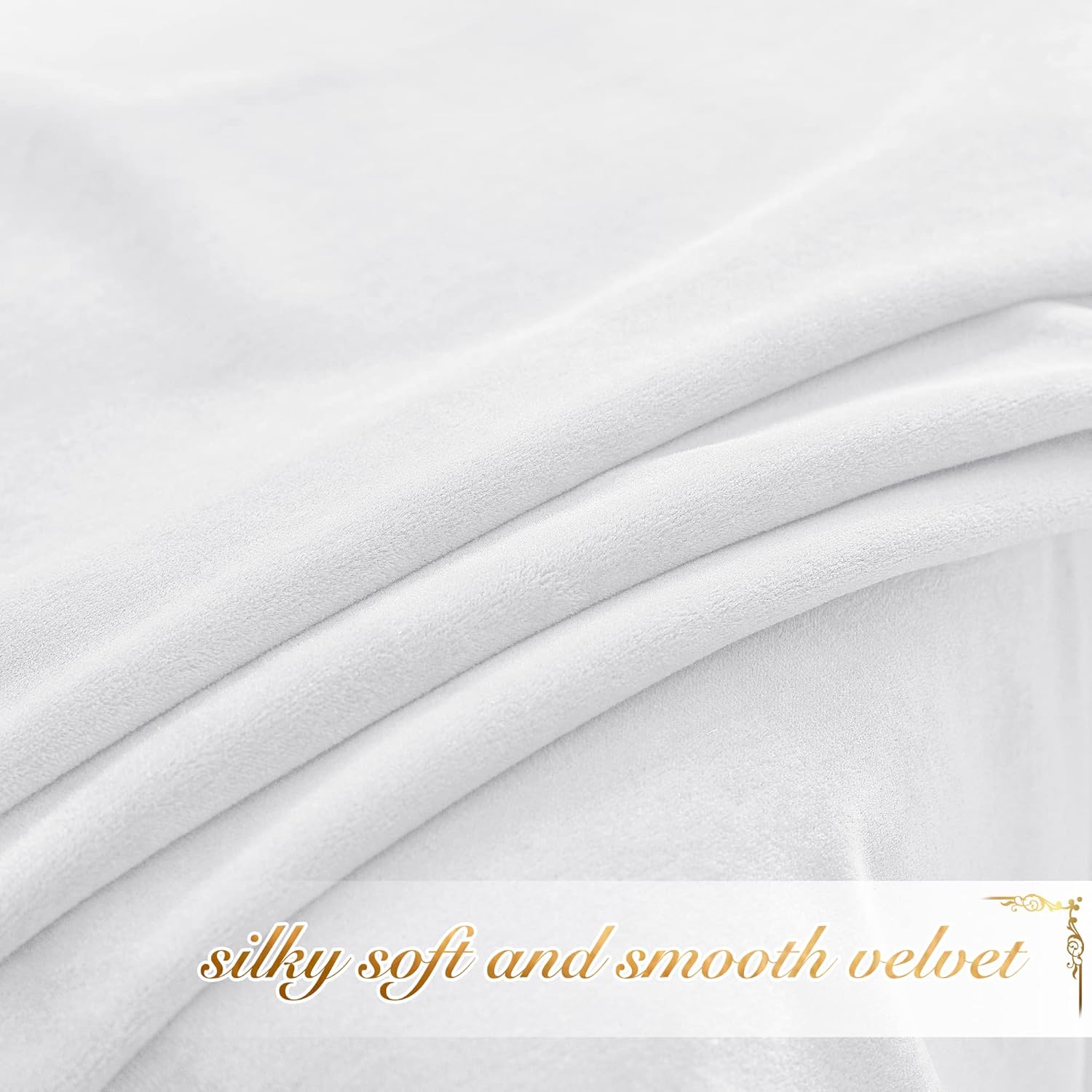 Close-up of white, silky soft velvet fabric with gentle folds, showcasing its smooth texture.