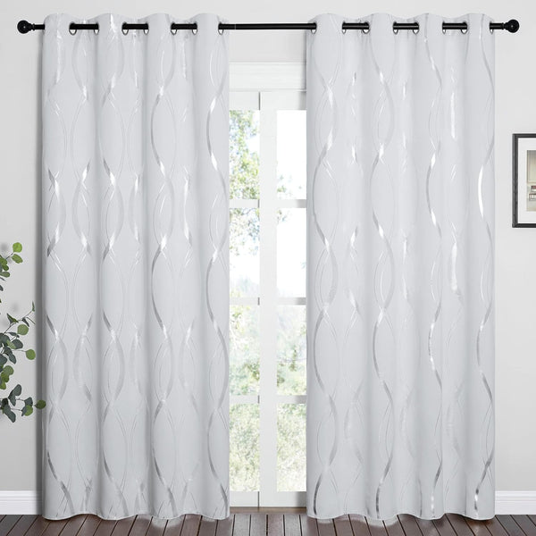 Pair of white fabric curtains with shimmering silver wavy pattern and black grommet tops